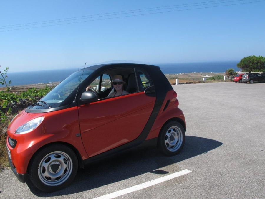 Sarah in her smart car on Santorini