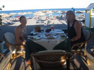 Eating again!! This time at the black beach, Santorini