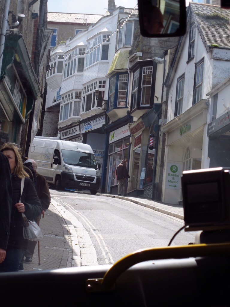 Watch out, bus coming through. Driving on the footpath in St. Ives, England