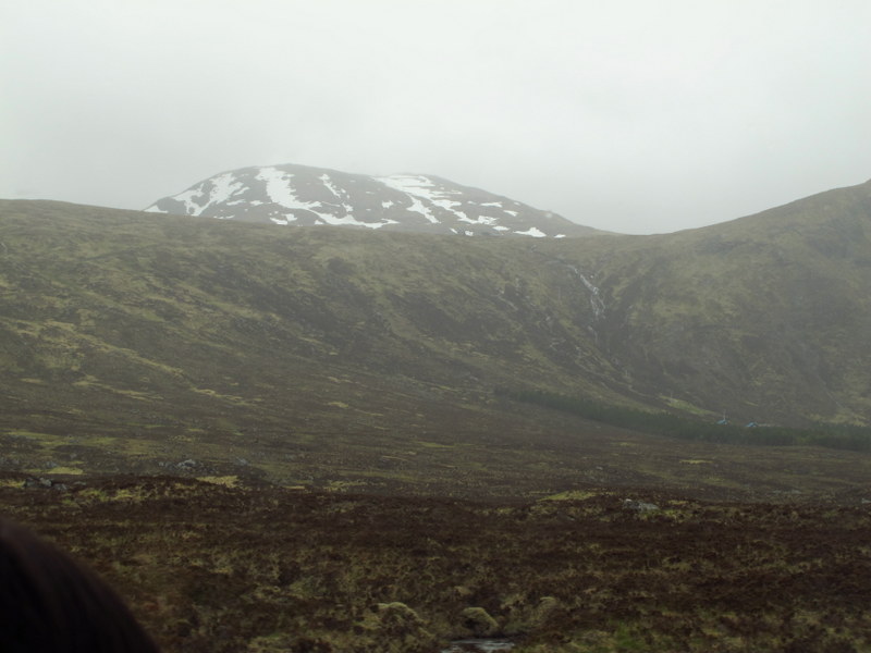 Snow on the mountains in summer, Scottish highlands