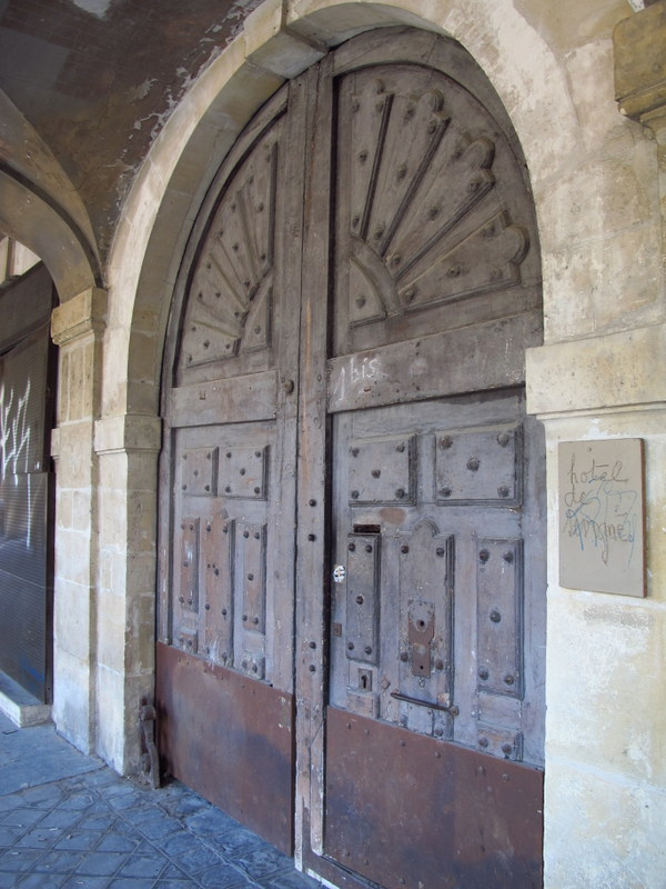 great door at place des vosges paris