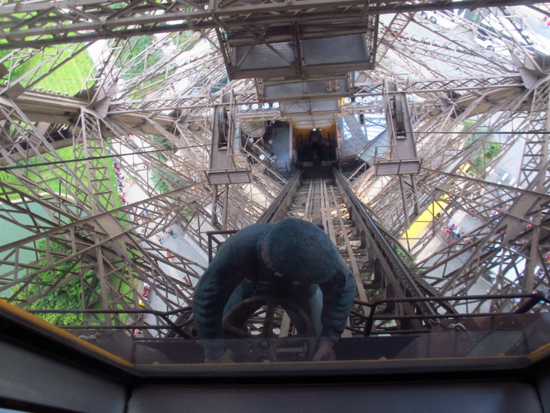 elevator driver going down the eiffel tower paris - lol