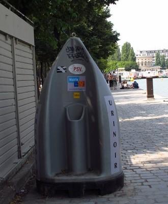 Urinals along the banks of the canal in Paris!!!!