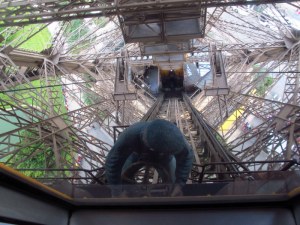 lift driver going down the eiffel tower