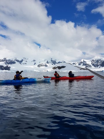 Lousie in her blue kayak