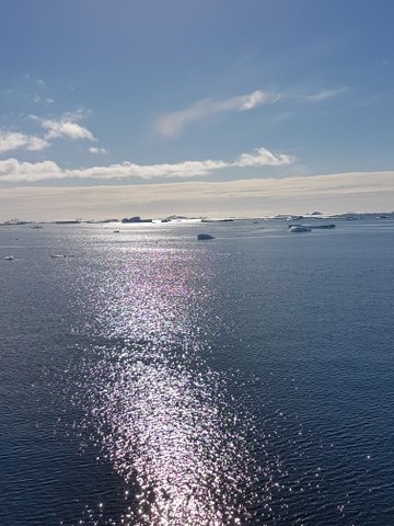 Sun hitting the water in Antarctica