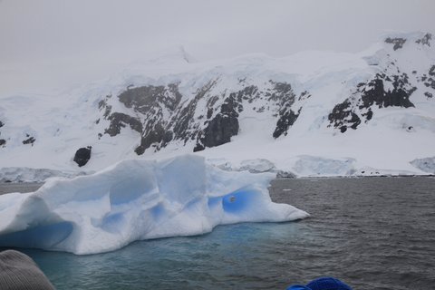 Gorgeous blue ice shining in the shadows